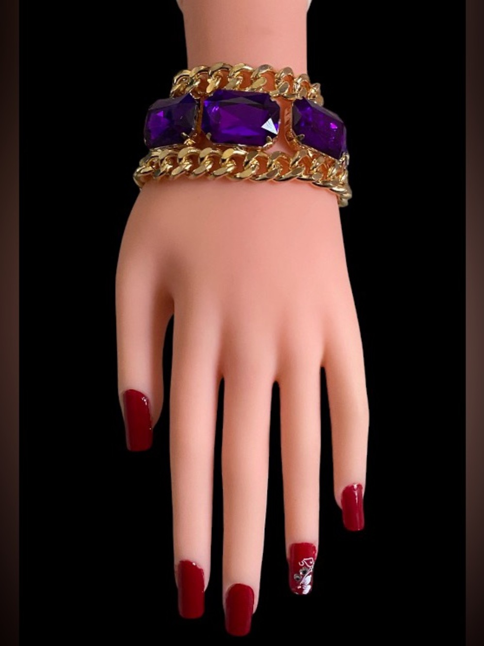 Elegant goldtone purple resin statement bracelet